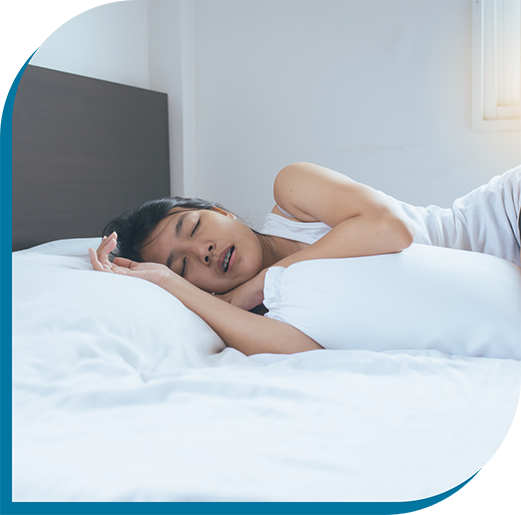 Woman sleeping on her side with her mouth open